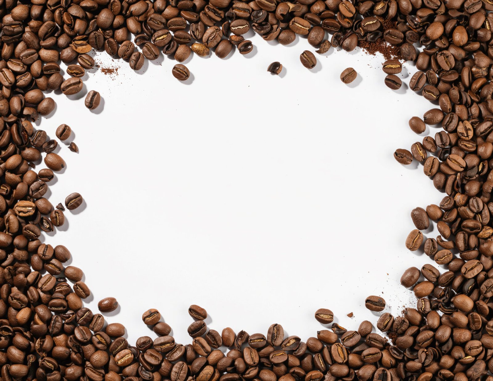 roasted-coffee-beans-frame-with-copyspace-on-white-background